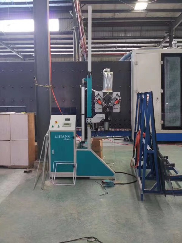 La macchina di rifornimento disseccante raggiunge automaticamente automaticamente le azioni dei luoghi di perforazione nei telai del distanziatore